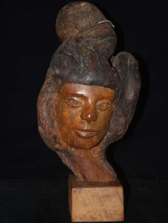 Escultura, rostro femenino en madera, sin título