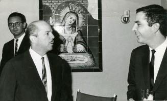 Presidente Héctor García Godoy y otra persona