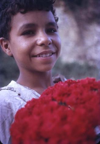 Niño con claveles