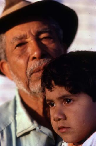 Anciano con sombrero y niño de Santiago