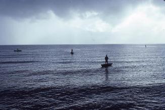 Silueta de pescadores en Sabana de la Mar II